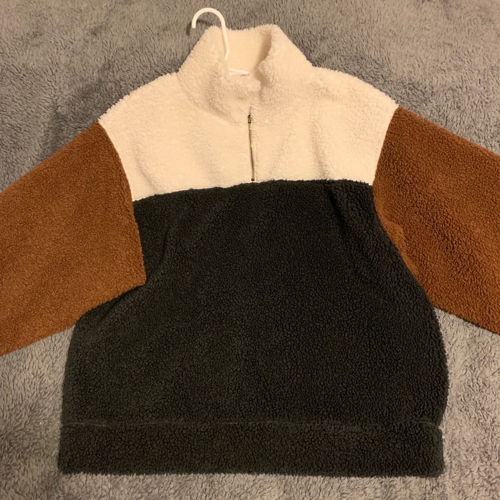 Cream, White, and Black fleece/fluffy quarter zip